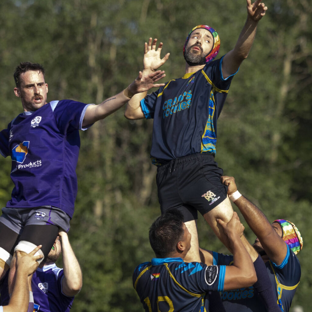 Two Muddy York players lifting another in a lineout at Bingham Cup.